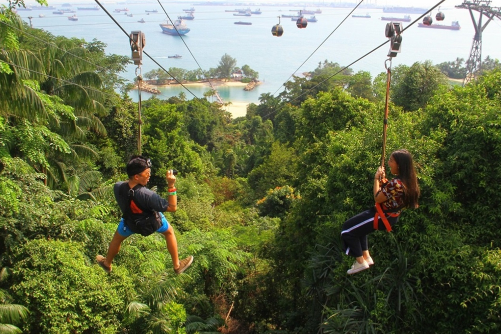 Mega Adventure - Singapore - Experience the thrill of Mega Adventure Singapore, featuring the iconic MegaZip zipline that soars over jungle, beach, and sea. Conquer the MegaClimb high ropes adventure course, perfect for all ages. Enjoy adrenaline-pumping activities with breathtaking views, creating unforgettable memories. Adventure and fun await for the whole family. Mega Adventure - Singapore - Image 1 of 5