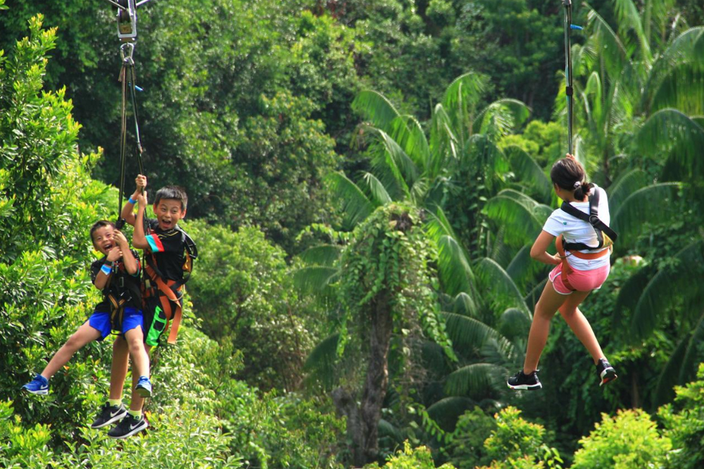 Mega Adventure - Singapore - Experience the thrill of Mega Adventure Singapore, featuring the iconic MegaZip zipline that soars over jungle, beach, and sea. Conquer the MegaClimb high ropes adventure course, perfect for all ages. Enjoy adrenaline-pumping activities with breathtaking views, creating unforgettable memories. Adventure and fun await for the whole family. Mega Adventure - Singapore - Image 3 of 5