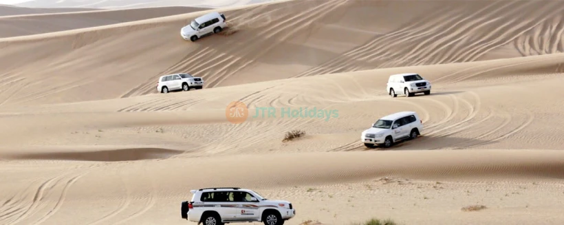 Morning Desert Safari Abu Dhabi - Experience the excitement of a 4x4 dune bashing adventure in Al Khatim Desert, Abu Dhabi. Join our Morning Desert Safari for camel rides, sandboarding, and refreshing campsite moments. Book now for an unforgettable desert experience. Morning Desert Safari Abu Dhabi - Image 4 of 5