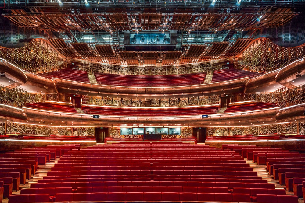 Dubai Opera - Discover the magic of Dubai Opera, an iconic venue in Downtown Dubai. Experience world-class performances, including concerts, ballet, theater, and opera. Take a guided tour to explore its unique architecture, history, and backstage areas. Perfect for art and culture enthusiasts. Dubai Opera - Image 4 of 5