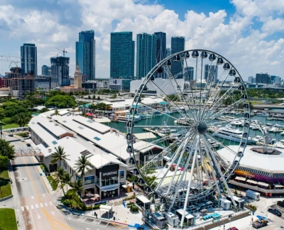 Skyviews Miami Observation Wheel - Experience breathtaking panoramic views of Miami from the Skyviews Miami Observation Wheel. Ride in a climate-controlled gondola and take in stunning sights of Biscayne Bay, Bayfront Park, and the dazzling Downtown Miami skyline. Whether it’s a romantic evening or a fun adventure with family and friends, the Skyviews Miami Observation Wheel offers an unforgettable experience. Capture picture-perfect moments as you soar above the city. Don't miss this must-visit attraction for the best views in Miami. Skyviews Miami Observation Wheel - Image 2 of 5