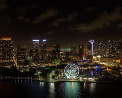 Skyviews Miami Observation Wheel - Experience breathtaking panoramic views of Miami from the Skyviews Miami Observation Wheel. Ride in a climate-controlled gondola and take in stunning sights of Biscayne Bay, Bayfront Park, and the dazzling Downtown Miami skyline. Whether it’s a romantic evening or a fun adventure with family and friends, the Skyviews Miami Observation Wheel offers an unforgettable experience. Capture picture-perfect moments as you soar above the city. Don't miss this must-visit attraction for the best views in Miami. Skyviews Miami Observation Wheel - Image 5 of 5