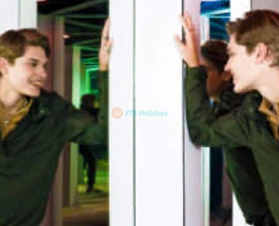 Mirror Maze Ticket at American Dream - Step into a world of illusions with a Mirror Maze ticket at American Dream. Navigate through endless reflections, dazzling neon lights, and mind-bending pathways for a fun and challenging adventure. Test your senses as you find your way out of the maze while capturing amazing photos. Mirror Maze Ticket at American Dream - Image 2 of 5