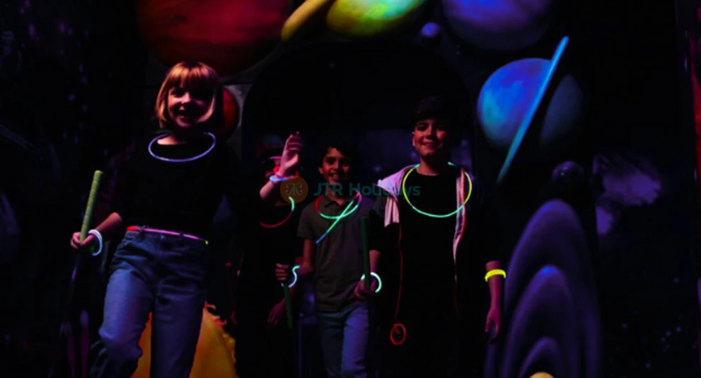 Blacklight Mini Golf at American Dream - Experience the glow-in-the-dark fun of Blacklight Mini Golf at American Dream! Challenge yourself on an exciting 18-hole course with unique obstacles and vibrant neon artwork. Capture memorable moments in this immersive and interactive mini golf adventure. Book your Blacklight Mini Golf ticket now for an unforgettable experience! Blacklight Mini Golf at American Dream - Image 1 of 5
