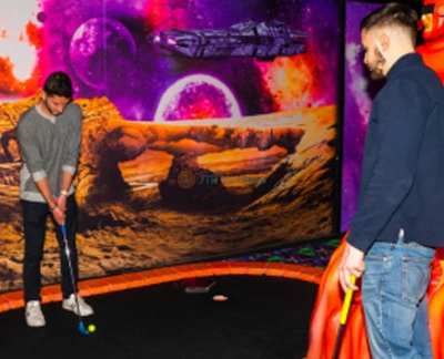 Blacklight Mini Golf at American Dream - Experience the glow-in-the-dark fun of Blacklight Mini Golf at American Dream! Challenge yourself on an exciting 18-hole course with unique obstacles and vibrant neon artwork. Capture memorable moments in this immersive and interactive mini golf adventure. Book your Blacklight Mini Golf ticket now for an unforgettable experience! Blacklight Mini Golf at American Dream - Image 5 of 5