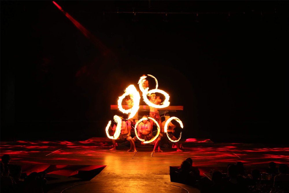 Taotao Tasi Guam - Experience the magic of Taotao Tasi Guam, an unforgettable beachfront dinner show featuring breathtaking Polynesian performances, fire dancing, and a delicious island-style buffet. Book your night of entertainment now! Taotao Tasi Guam - Image 1 of 5