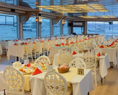 Mega Lufer Bosphorus Dinner Cruise and Show with Private Table - Experience a magical night on the Mega Lufer Bosphorus Dinner Cruise and Show with Private Table in Istanbul. Enjoy a delicious dinner, live Turkish entertainment, and stunning views of iconic landmarks. Sail along the Bosphorus under the city lights for an unforgettable evening. Book now for a luxurious dining and sightseeing experience! Mega Lufer Bosphorus Dinner Cruise and Show with Private Table - Image 5 of 5