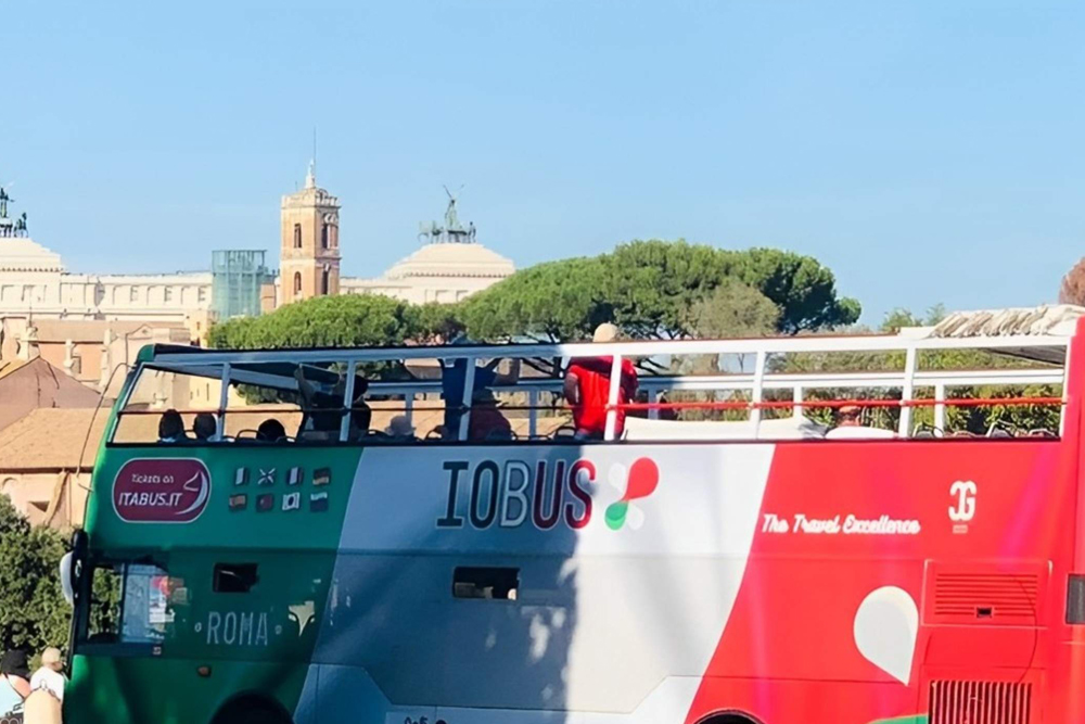 Colosseum, Roman Forum & Palatine Hill with panoramic open bus ticket - Discover the Colosseum, Roman Forum, and Palatine Hill with a panoramic open bus ticket. Walk through ancient ruins, explore Rome’s rich history, and enjoy stunning city views from an open-top bus. Experience the best of the Eternal City in one unforgettable tour. Book your adventure today! Colosseum, Roman Forum & Palatine Hill with panoramic open bus ticket - Image 4 of 5