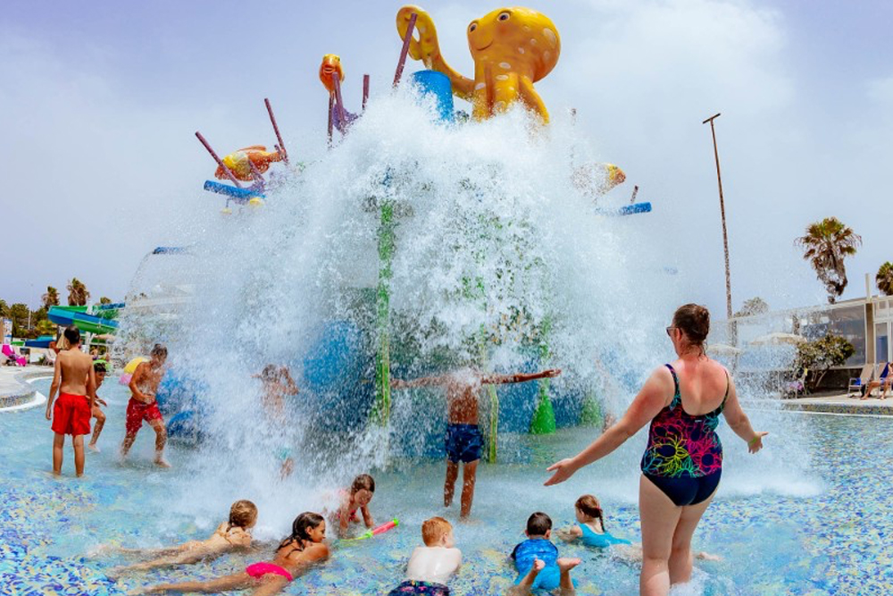 Aqualava Waterpark ticket in Lanzarote - Enjoy a thrilling day at Aqualava Waterpark in Lanzarote with exciting slides, a wave pool, and a lazy river. Relax in geothermal-heated pools and explore a fun-filled kids' area. Take in stunning volcanic views while enjoying top facilities. Book your Aqualava Waterpark ticket now for an unforgettable adventure. Aqualava Waterpark ticket in Lanzarote - Image 3 of 5
