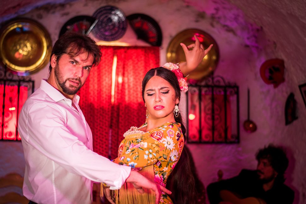 Cuevas Los Tarantos flamenco show in Sacromonte - Experience the Cuevas Los Tarantos flamenco show in Sacromonte, Granada, and enjoy an authentic Spanish performance. Witness passionate dancers, live guitar, and rhythmic clapping in a unique cave setting. Immerse yourself in the rich Andalusian culture and gypsy flamenco traditions. Book your unforgettable flamenco night in Granada today! Cuevas Los Tarantos flamenco show in Sacromonte - Image 3 of 5