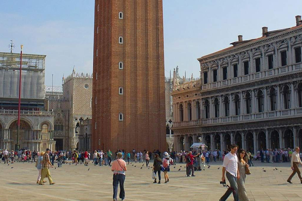 St. Mark's Campanile ticket in Venice - Get your St. Mark’s Campanile ticket and enjoy stunning panoramic views of Venice. Skip the lines and take the modern elevator to the top of this iconic bell tower. Admire breathtaking sights of St. Mark’s Basilica, the Grand Canal, and the Venetian Lagoon. Learn about the tower’s rich history, including Galileo’s telescope demonstrations. Book now for a seamless and unforgettable experience in Venice! St. Mark's Campanile ticket in Venice - Image 3 of 5
