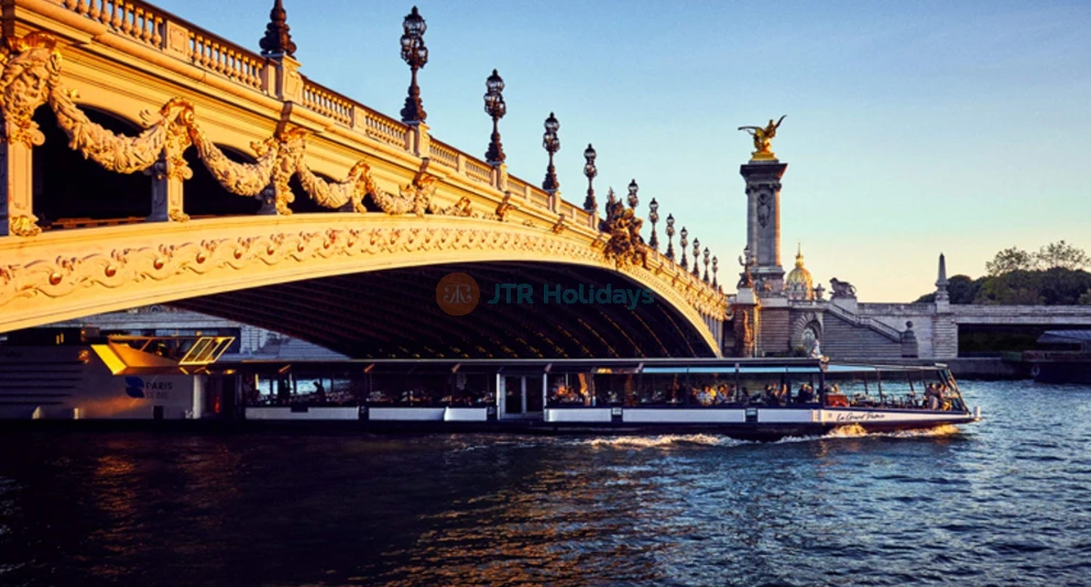 Lunch Cruise on the Seine River - Enjoy a Lunch Cruise on the Seine River and discover Paris from the water. This scenic Seine River cruise offers stunning views of famous landmarks like the Eiffel Tower and the Louvre. Savor a traditional three-course meal while cruising along the Seine River. A Seine River lunch cruise is the perfect way to experience Paris in a relaxed and unique way. Book your Lunch Cruise on the Seine River for an unforgettable Paris experience. Lunch Cruise on the Seine River - Image 1 of 5