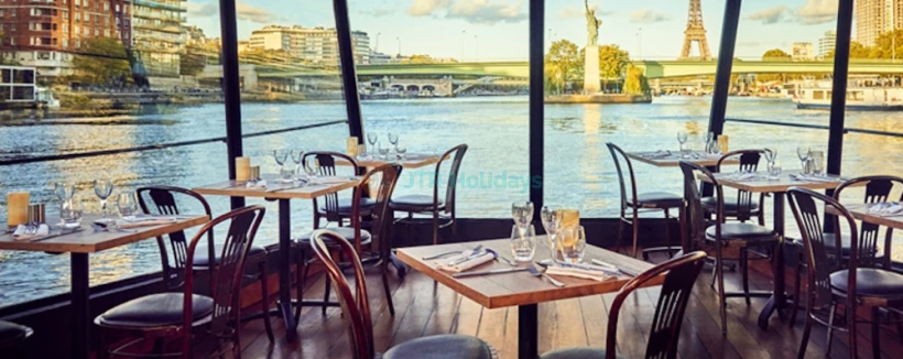 Lunch Cruise on the Seine River - Enjoy a Lunch Cruise on the Seine River and discover Paris from the water. This scenic Seine River cruise offers stunning views of famous landmarks like the Eiffel Tower and the Louvre. Savor a traditional three-course meal while cruising along the Seine River. A Seine River lunch cruise is the perfect way to experience Paris in a relaxed and unique way. Book your Lunch Cruise on the Seine River for an unforgettable Paris experience. Lunch Cruise on the Seine River - Image 3 of 5