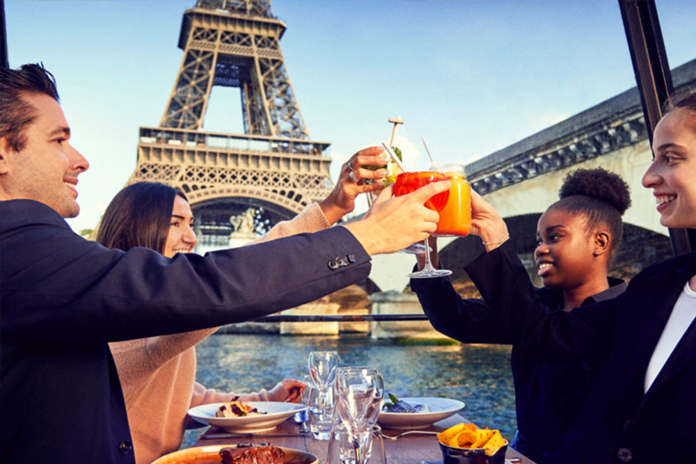 Lunch Cruise on the Seine River - Enjoy a Lunch Cruise on the Seine River and discover Paris from the water. This scenic Seine River cruise offers stunning views of famous landmarks like the Eiffel Tower and the Louvre. Savor a traditional three-course meal while cruising along the Seine River. A Seine River lunch cruise is the perfect way to experience Paris in a relaxed and unique way. Book your Lunch Cruise on the Seine River for an unforgettable Paris experience. Lunch Cruise on the Seine River - Image 4 of 5
