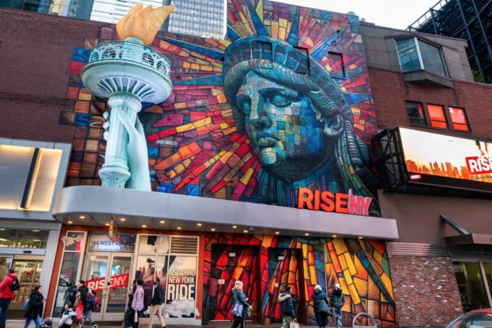RiseNY Admission in New York - Experience New York City in a whole new way at RiseNY. Feel the excitement of flying over iconic landmarks, from the Statue of Liberty to Central Park. Explore immersive galleries, discover why NYC is a global cultural hub, and enjoy a thrilling ride suspended 30 feet in the air. RiseNY Admission in New York - Image 1 of 5
