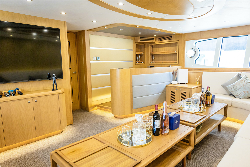 Dubai Astra Yacht - 76 FT - The Dubai Astra Yacht – 76 FT offers a premium yacht rental experience, perfect for exploring the beautiful coastline of Dubai in luxury and comfort. This spacious 76-foot yacht is ideal for private parties, romantic cruises, or family gatherings, featuring modern interiors, open decks, and a professional crew. Enjoy stunning views of iconic landmarks like the Burj Al Arab and Atlantis while relaxing on one of the top-rated luxury yachts in Dubai. Whether for a special occasion or a relaxing day at sea, the Dubai Astra Yacht – 76 FT is the perfect choice for a memorable yacht charter in Dubai. Dubai Astra Yacht - 76 FT - Image 3 of 5